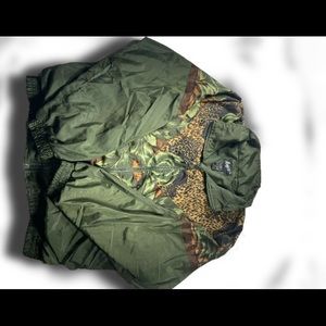 Vintage floral/animal print windbreaker jacket.